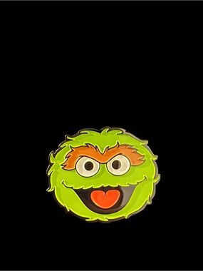 Oscar the Grouch Enamel Pin in Headgear floating case
